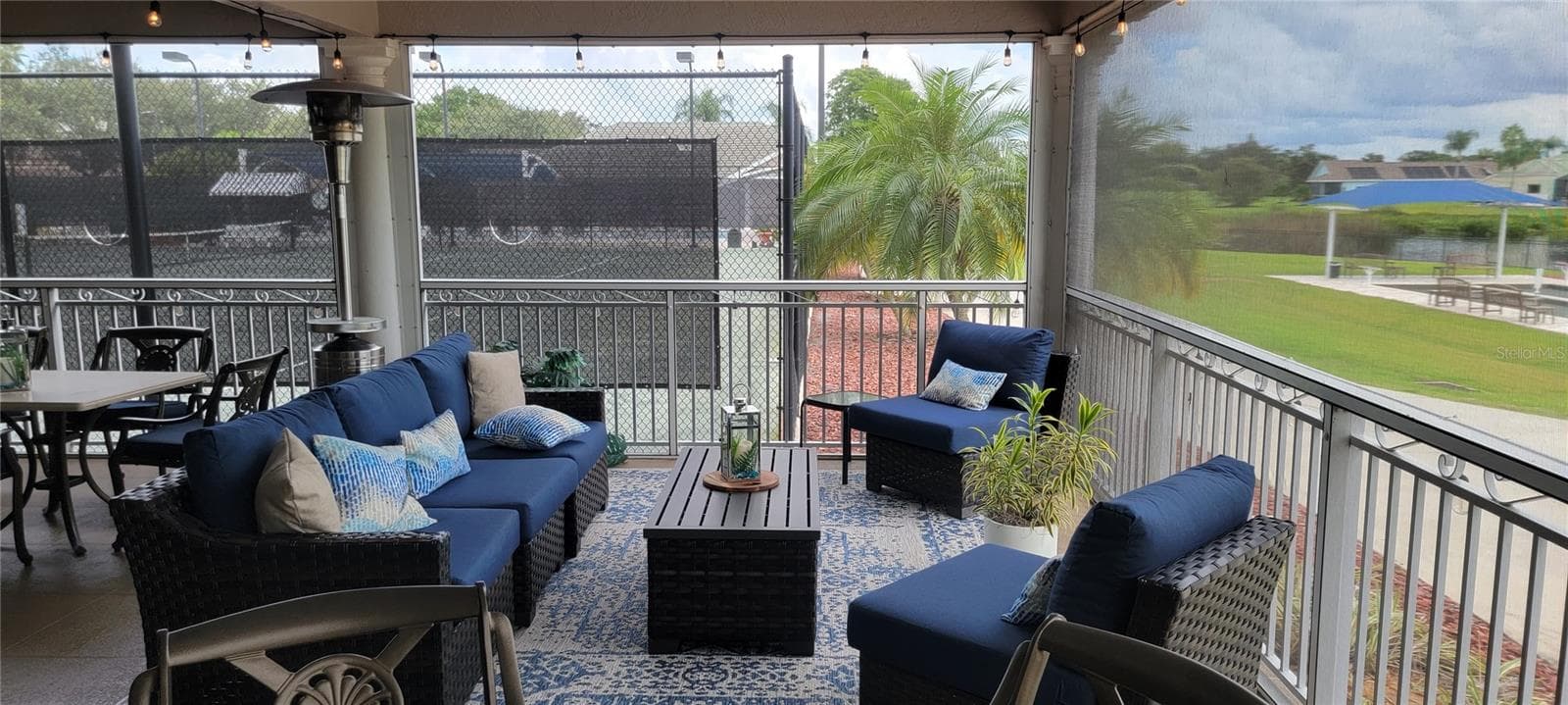 The Patio offers another indoor/outdoor space for casual relaxation plus food and beverage service - 6948 STONEYWALK CT, BRADENTON