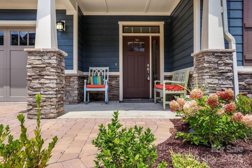Charming front portico, ideal for welcoming guests or enjoying morning coffee - 21 Craftsman Overlook Ridge, Arden