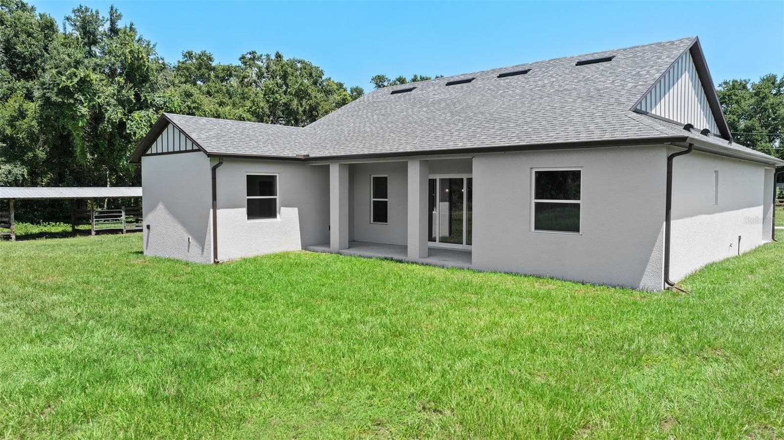 back of home - 13219 NEWGENT RD, SAN ANTONIO