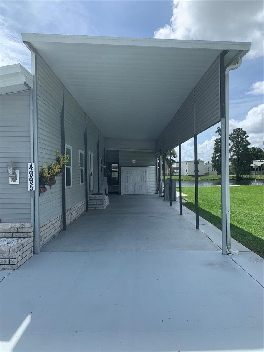 Manufactured Home at 4995 MOUNT OLIVE SHORES DR, POLK CITY, photo 7 of 75