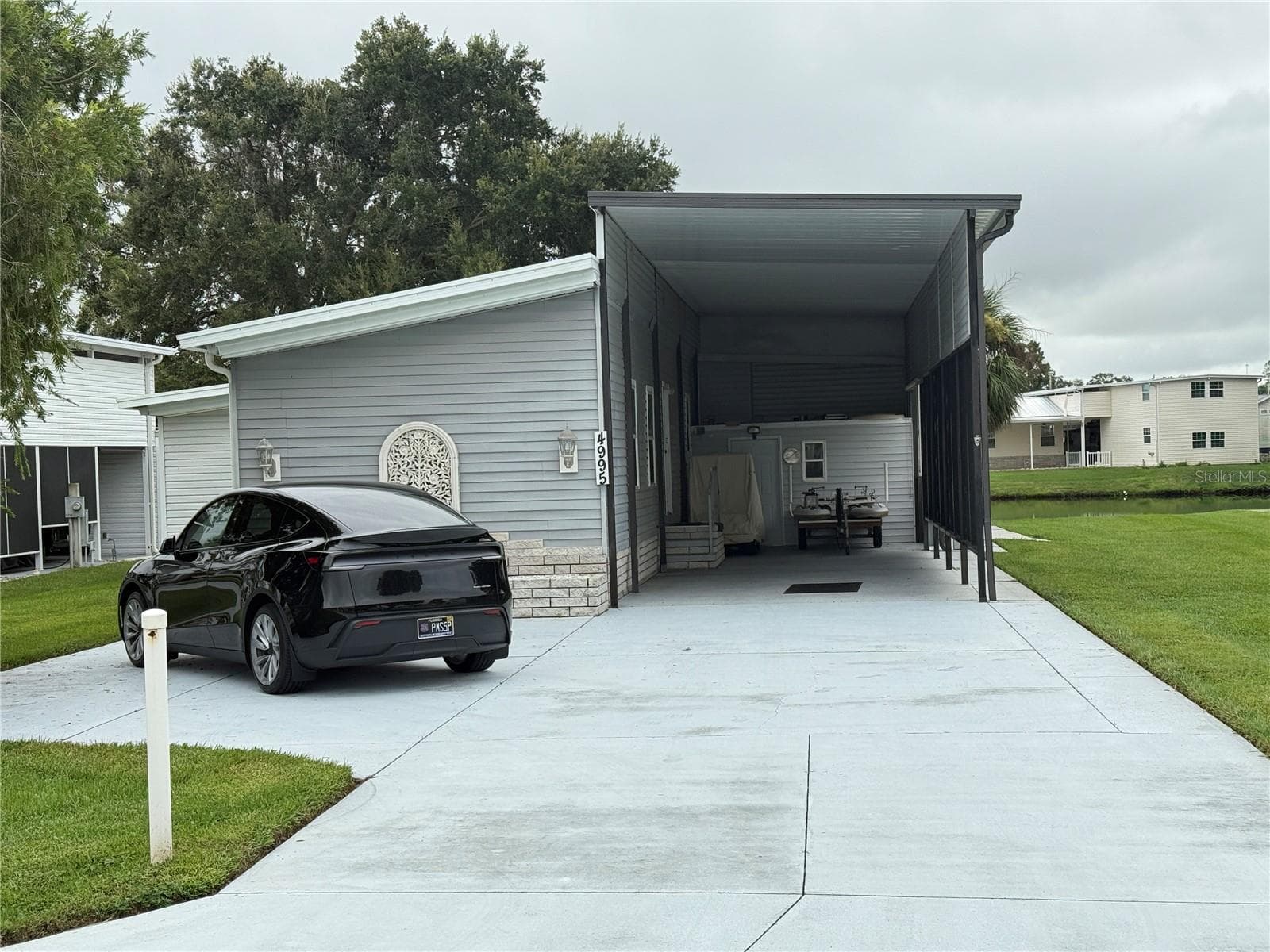 Manufactured Home at 4995 MOUNT OLIVE SHORES DR, POLK CITY, photo 49 of 75