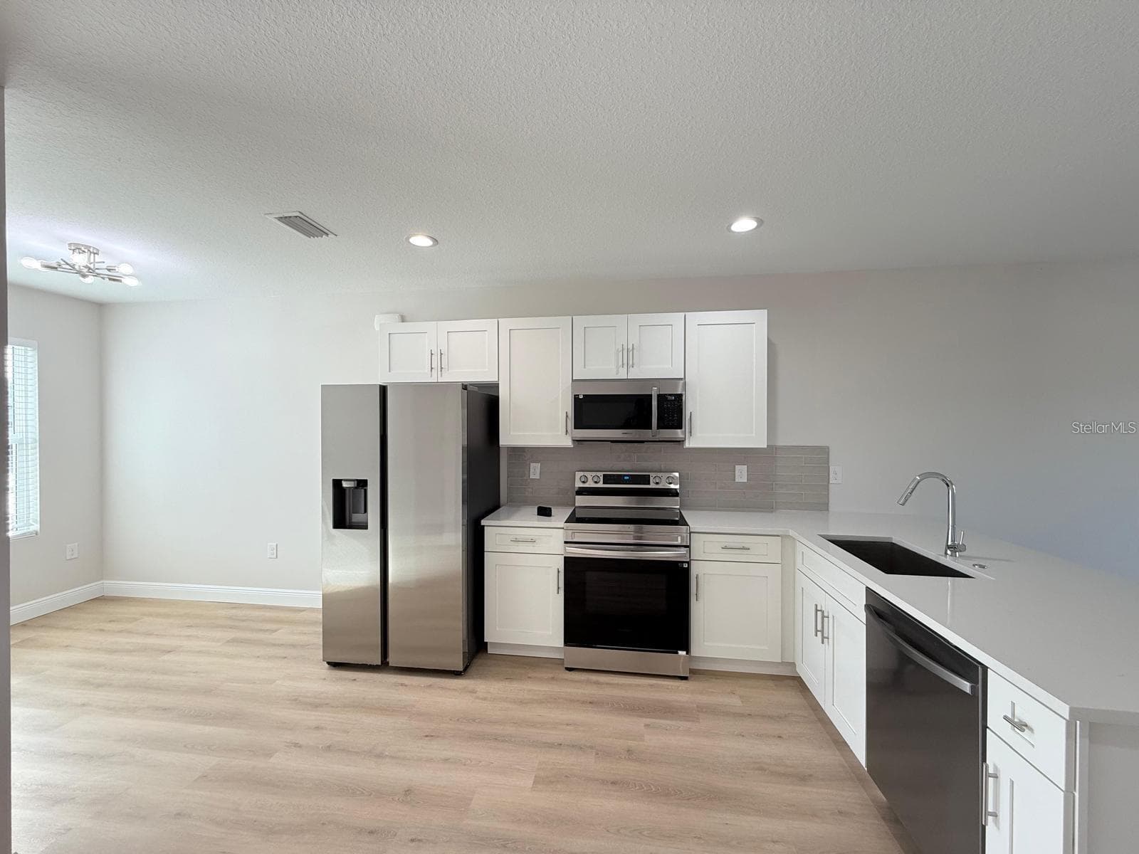 Example photo of the finished property. - 12231 KIRK AVE #2, PORT CHARLOTTE