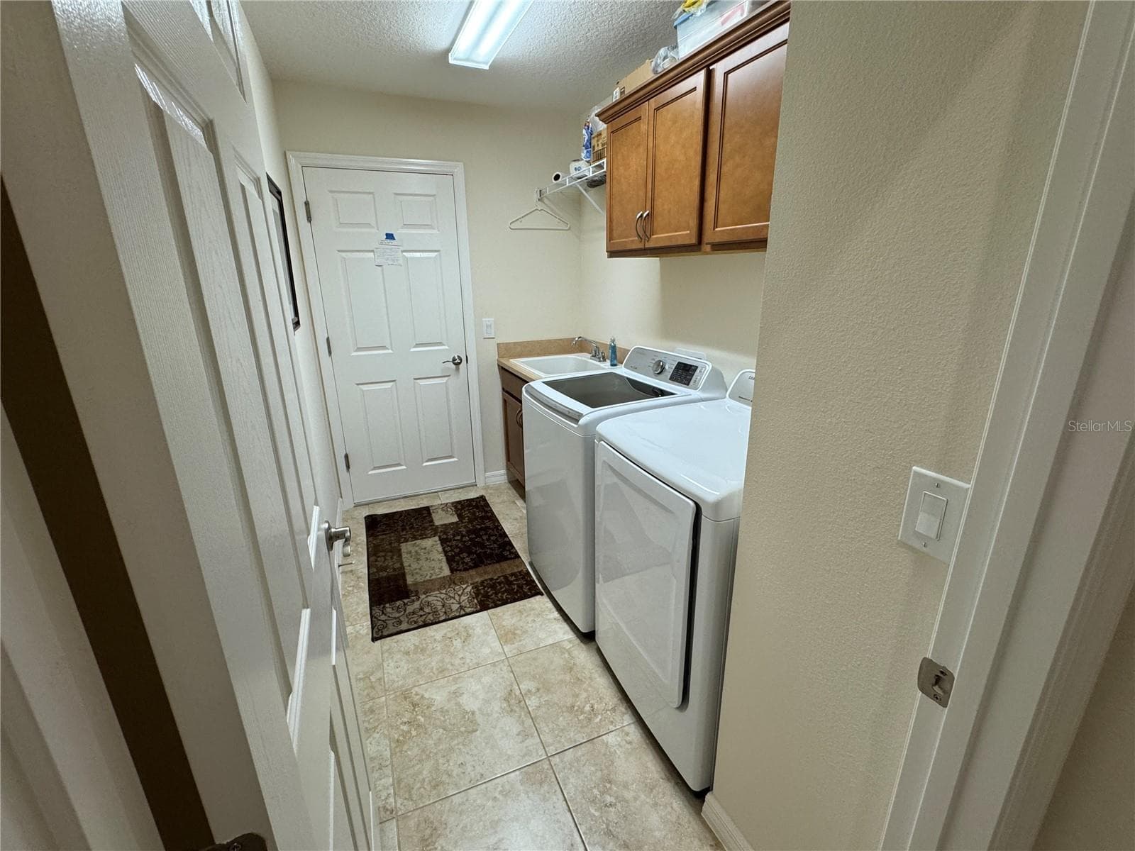 Spacious Laundry Room - 939 KOLLER CT, THE VILLAGES