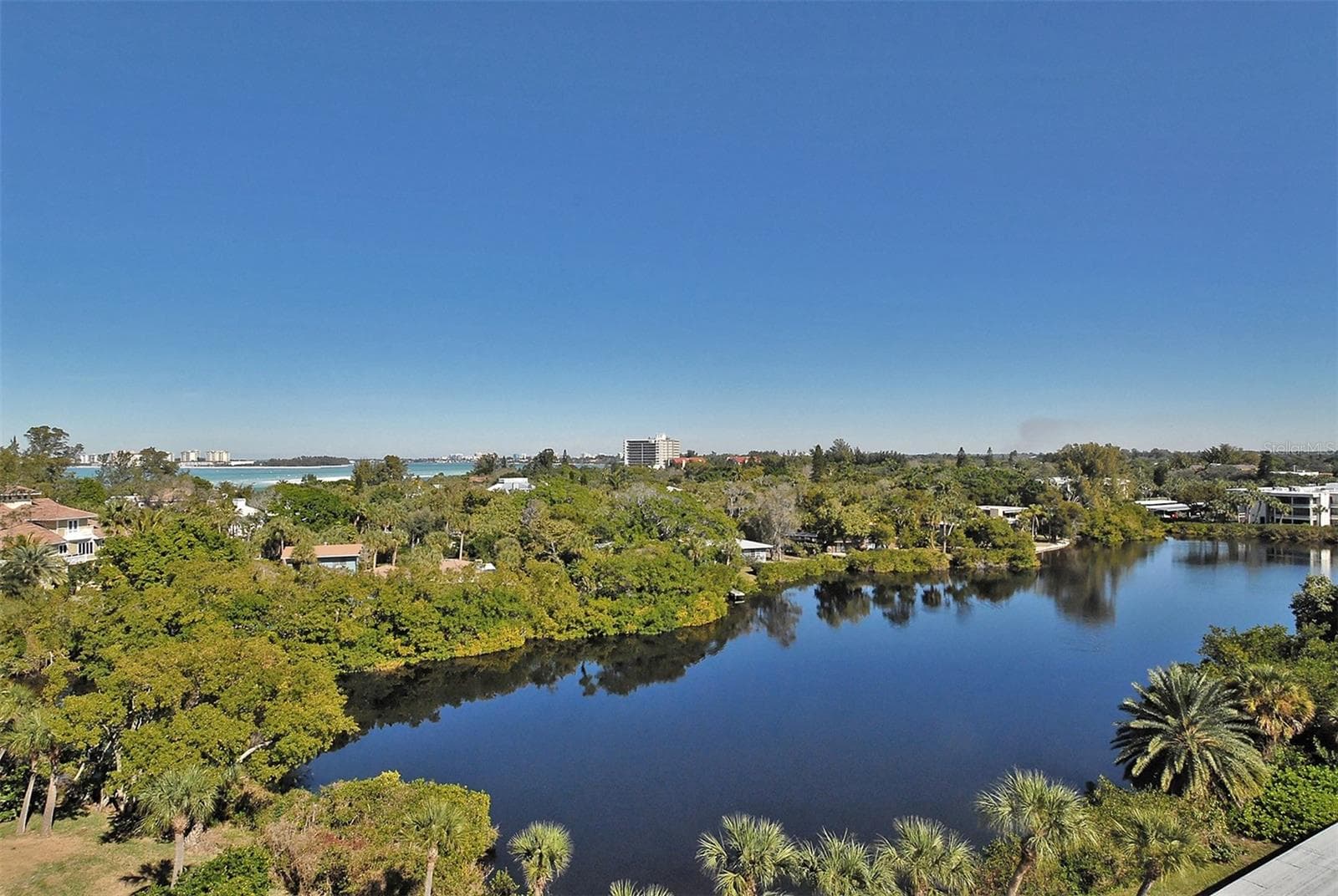 The shimmering lagoon running through the Whispering Sands property. - 225 HOURGLASS WAY #103, SARASOTA