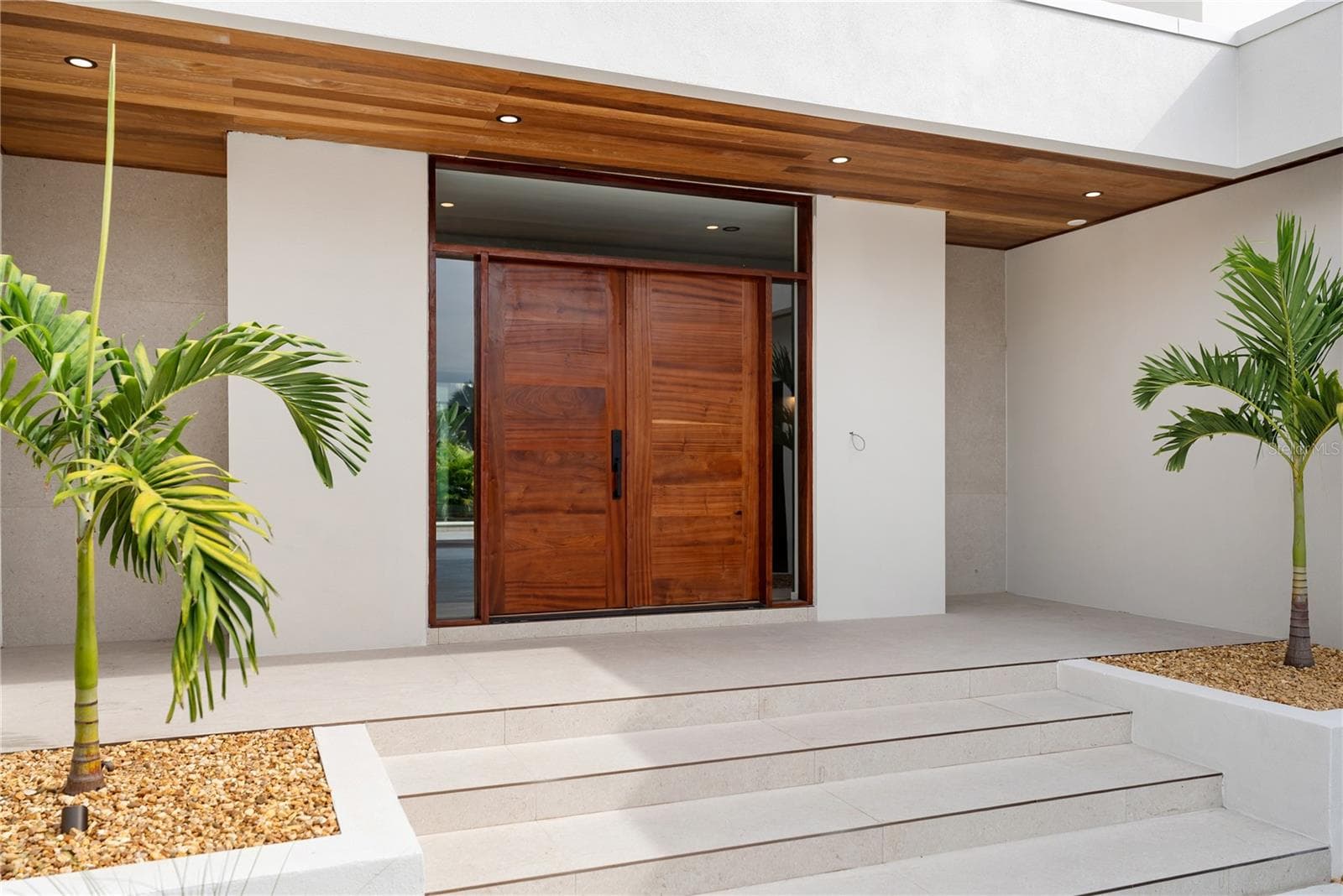Locally handcrafted African Sapele wood entry door - 1759 WALDEMERE ST, SARASOTA