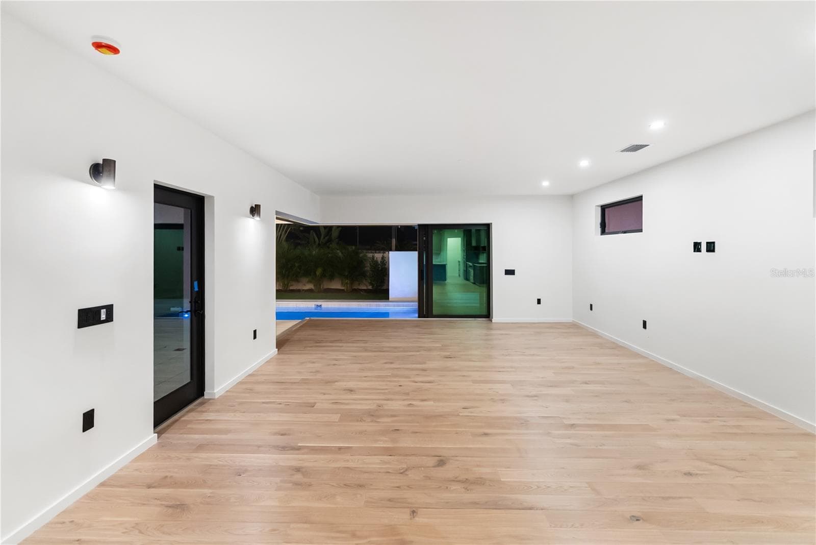 Open-concept design with seamless indoor–outdoor living. - 1759 WALDEMERE ST, SARASOTA