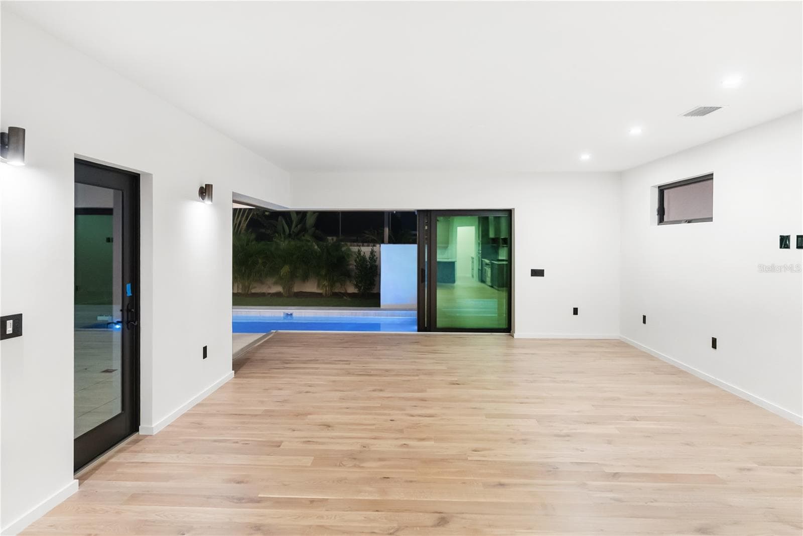 Open-concept design with seamless indoor–outdoor living. - 1759 WALDEMERE ST, SARASOTA