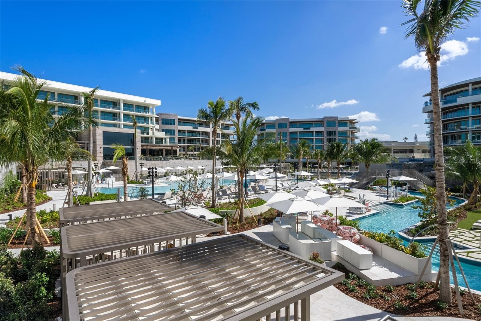 Pool, Cabanas, & Winding River - 1591 GULF OF MEXICO DR #413, LONGBOAT KEY