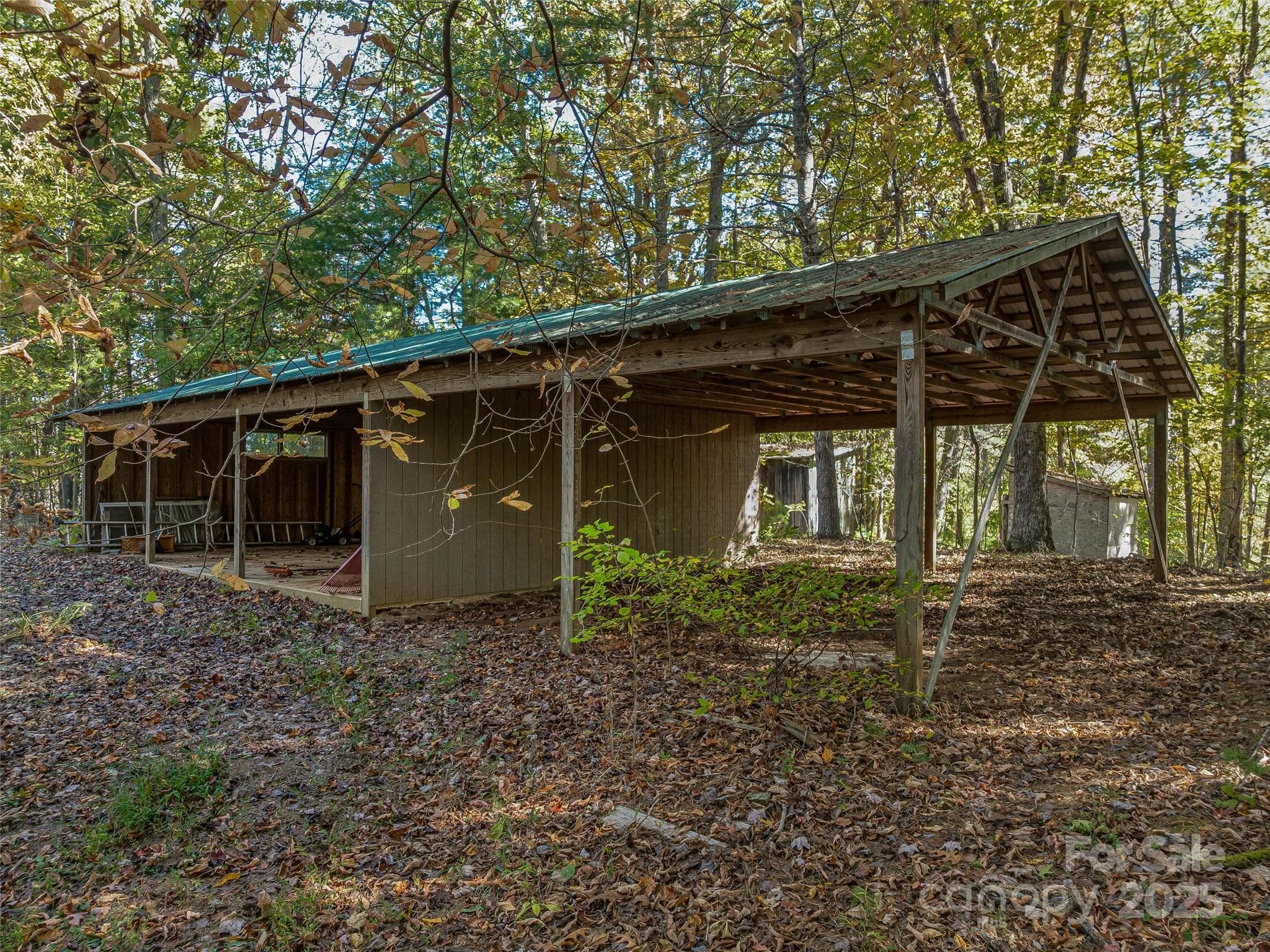 One homesite area next to the covered garage space. - 99999 Meadows Town Road, Marshall