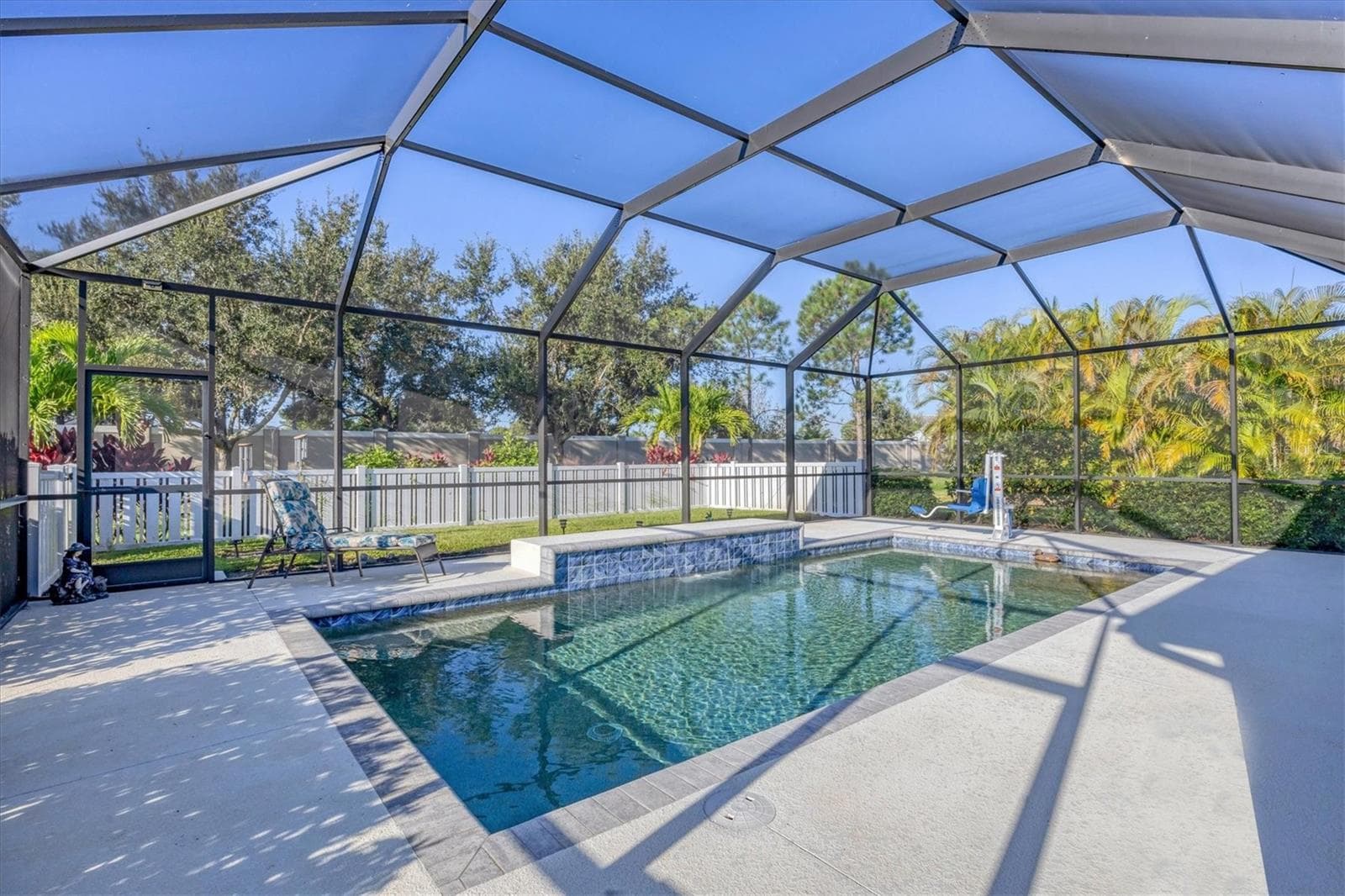 Pool View Looking West - 7040 WHITE WILLOW CT, SARASOTA