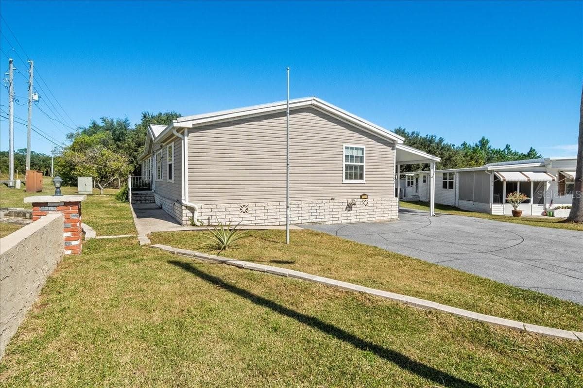 Manufactured Home at 101 EDGEWOOD BLVD, LAKE WALES, photo 44 of 63