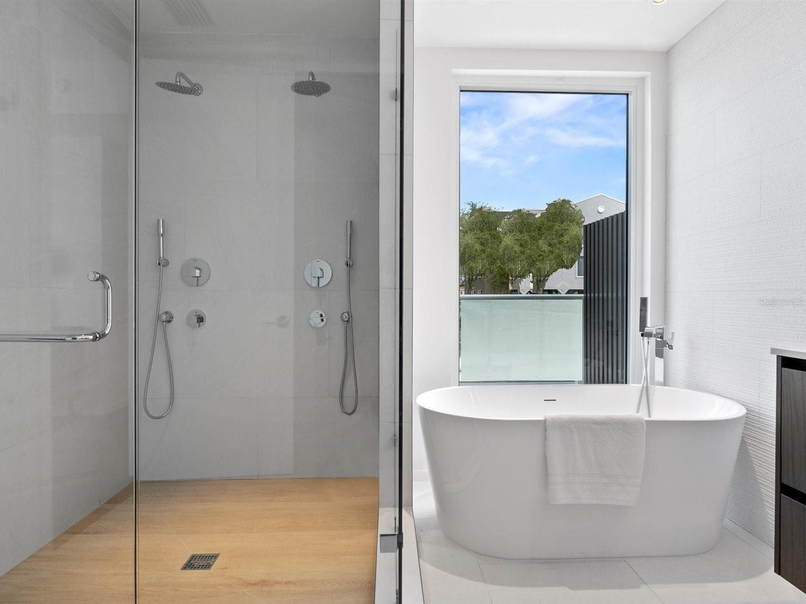 Master Bath - Double Shower and Separate Soaking Tub - 1020 SUNSET POINT RD #103, CLEARWATER