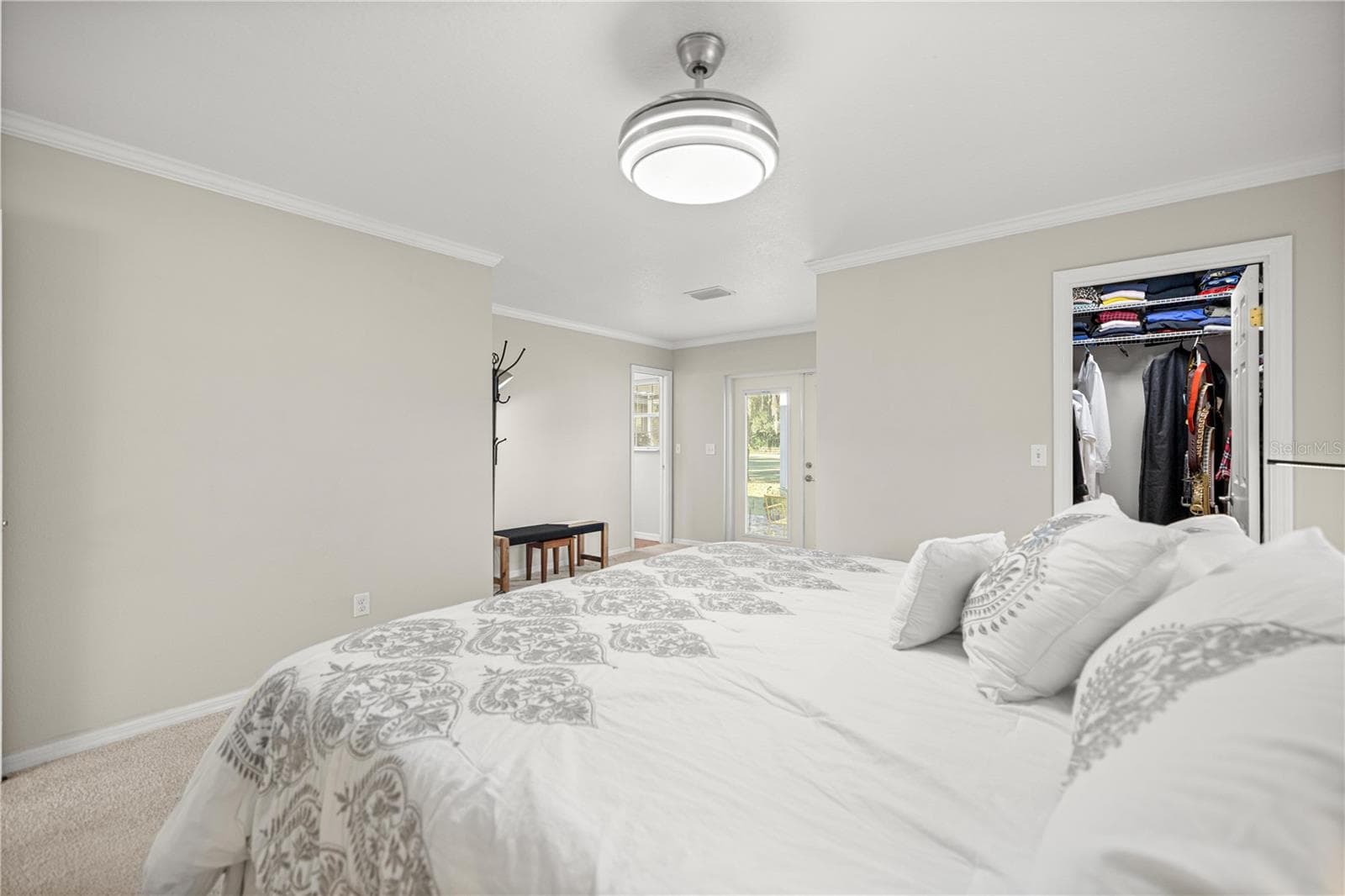 PRIMARY BEDROOM WITH WALKING CLOSET - 9812 SW 74TH AVE, OCALA