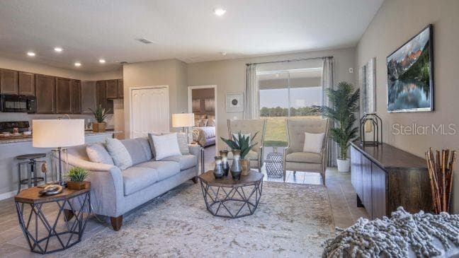 Model home - actual features may vary. - 808 SUNSHOWER DR, LADY LAKE