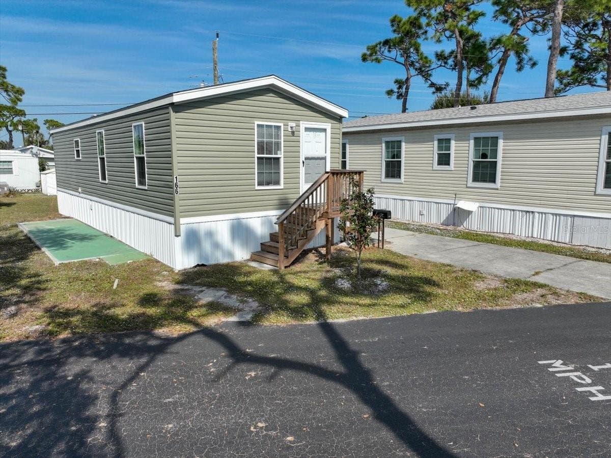 Manufactured Home at 1800 ENGLEWOOD RD #166, ENGLEWOOD, photo 2 of 34