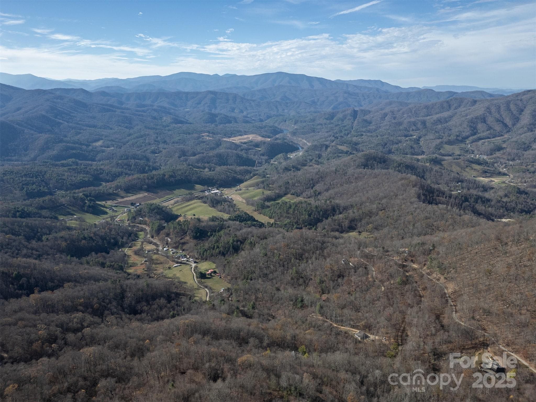 Long range views of nearby farms and mountains - Clyde