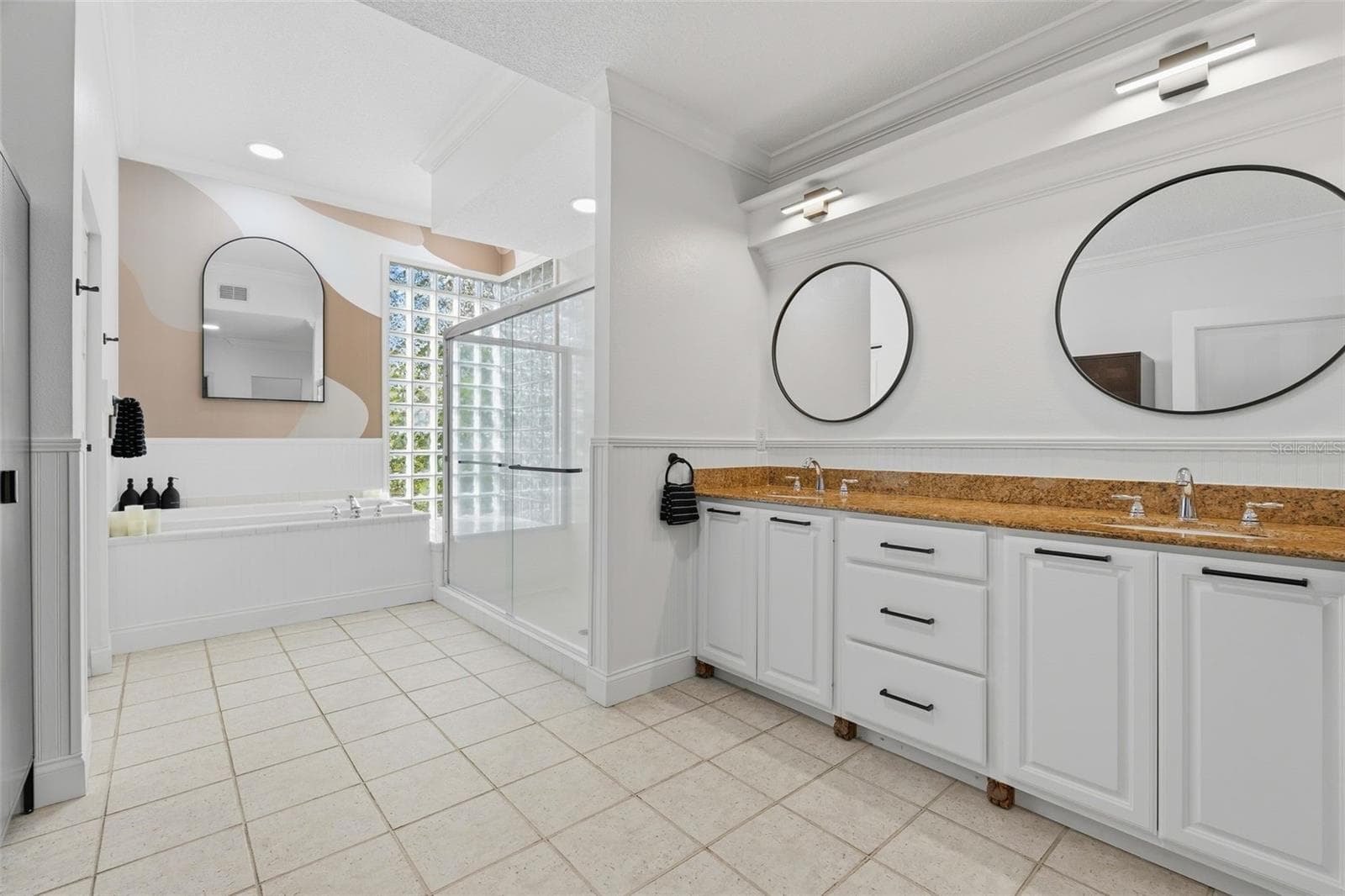 main bath has natural light from window and glass blocks - 6349 RAVENWOOD WAY, SARASOTA