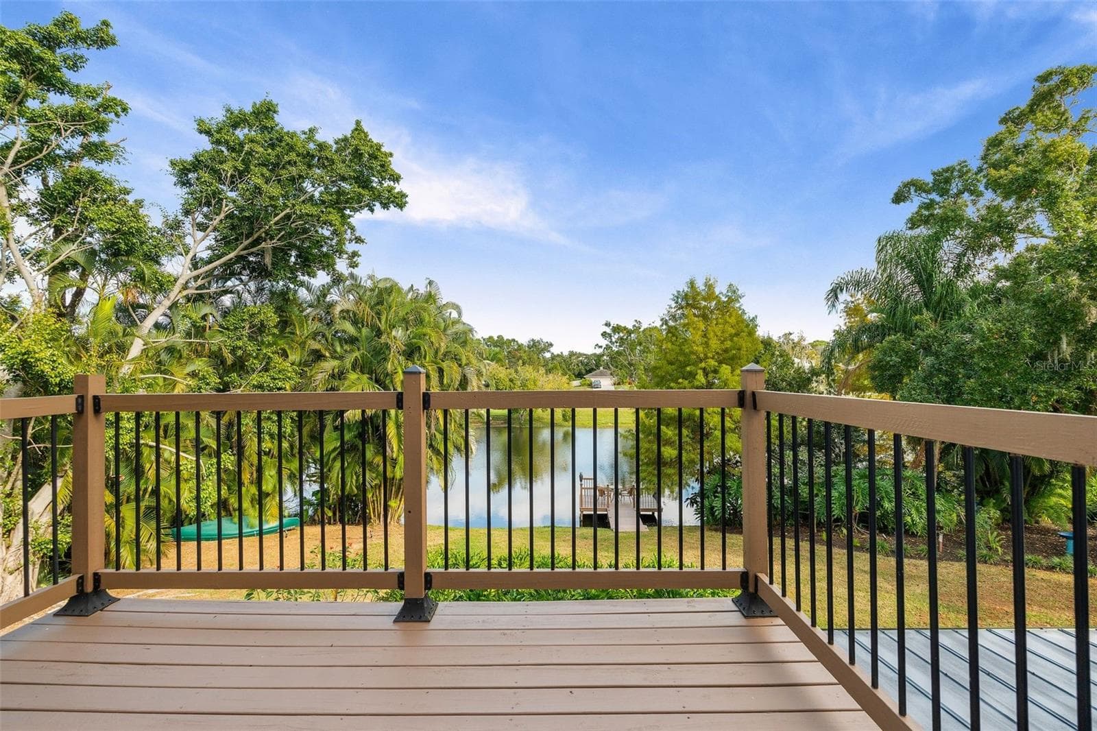 balcony overlooks lake - 6349 RAVENWOOD WAY, SARASOTA