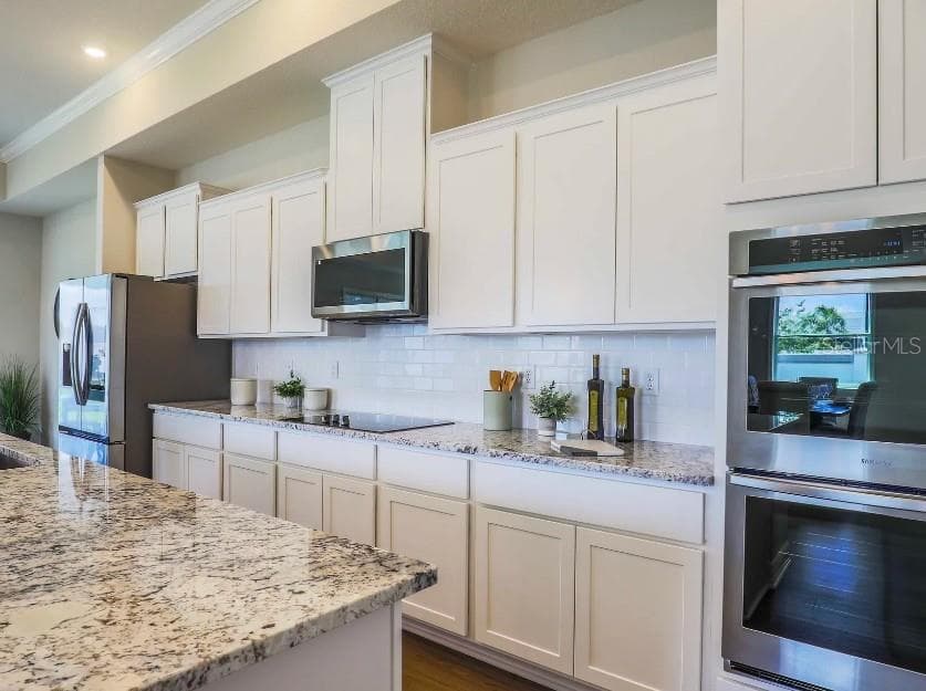 Model home - actual features may vary. - 930 BUCKEYE DR, LADY LAKE