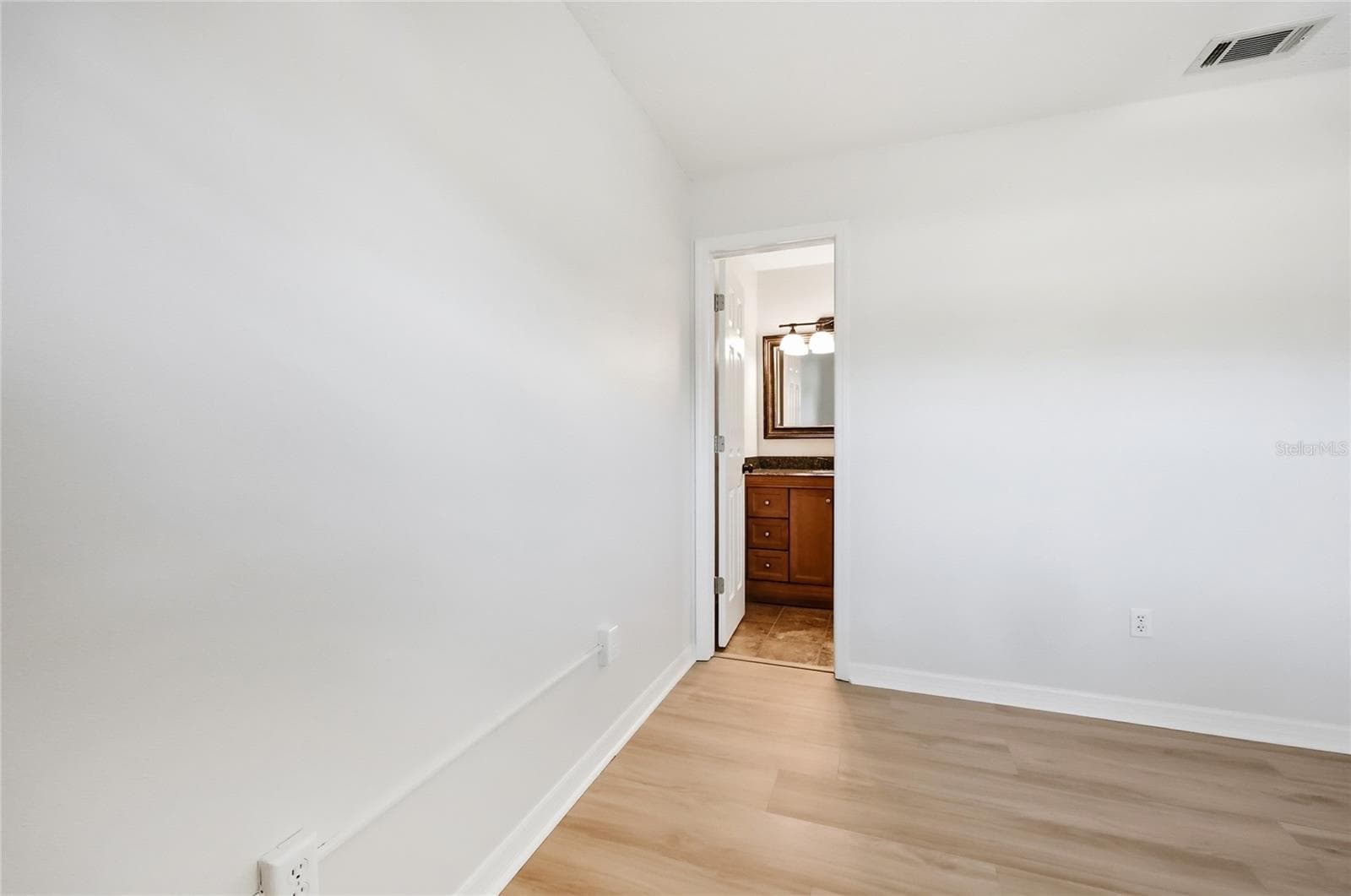 Primary bedroom showing en suite - 249 N HILL AVE #30, DELAND