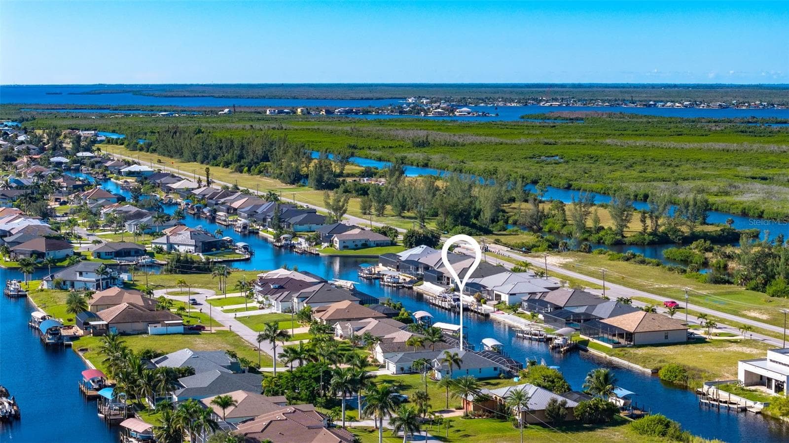Canal view - 430 NW 39TH AVE, CAPE CORAL