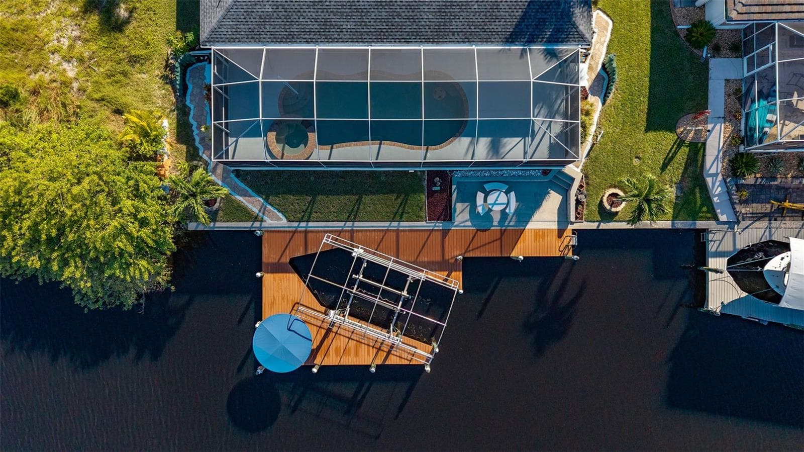 Canal view - 430 NW 39TH AVE, CAPE CORAL