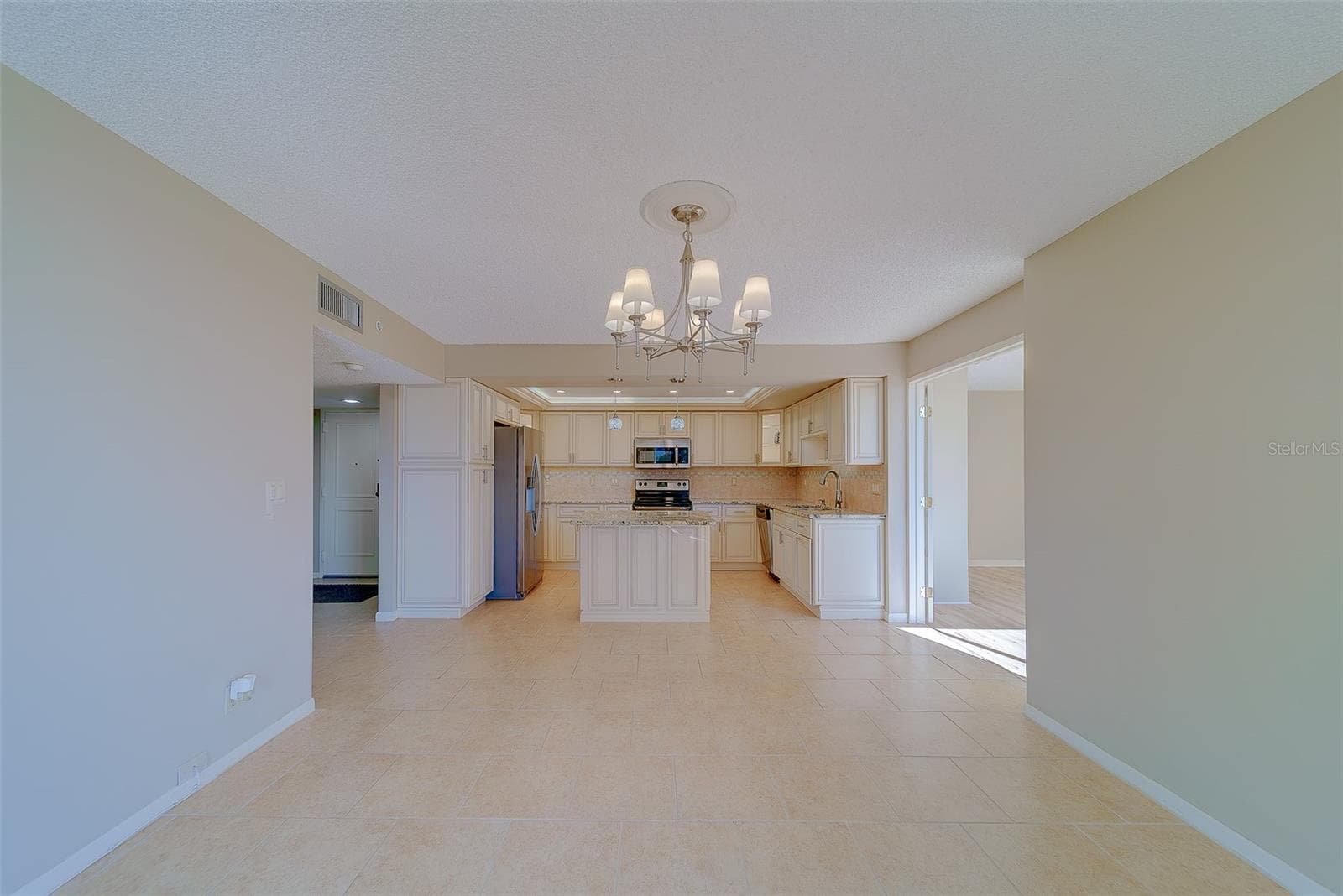 Dining Space going into kitchen - 1480 GULF BLVD #201, CLEARWATER BEACH