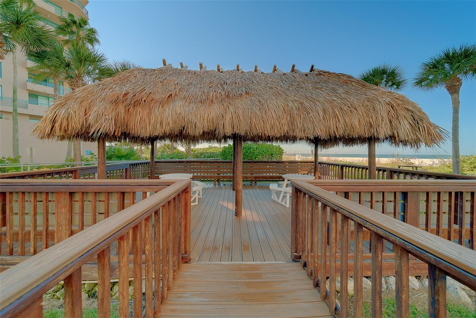 Tiki deck area with seating - 1480 GULF BLVD #201, CLEARWATER BEACH