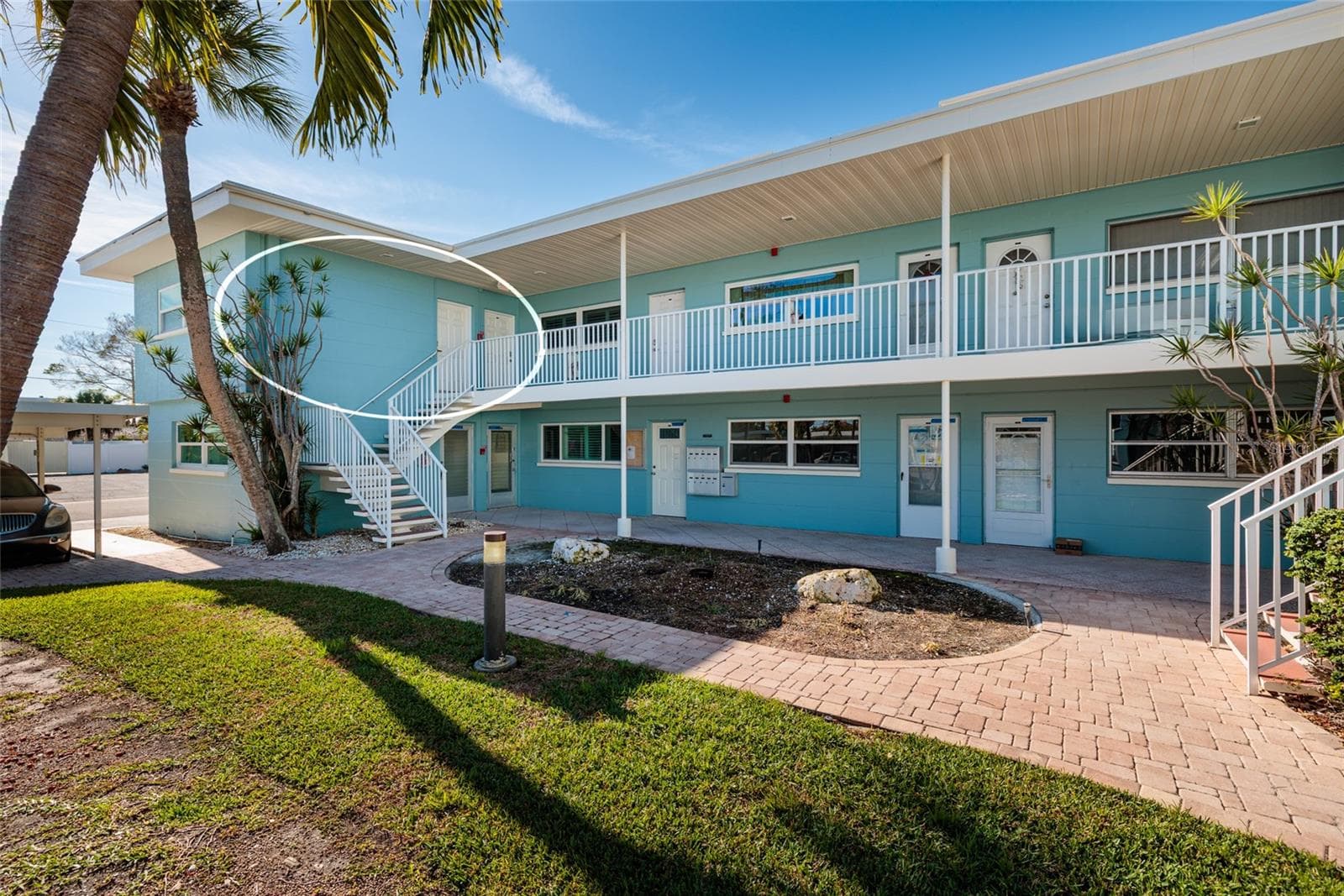 Unit 6 has 2 doors. Left is primary bedroom, right is main door. - 6000 2ND ST E #6, ST PETE BEACH