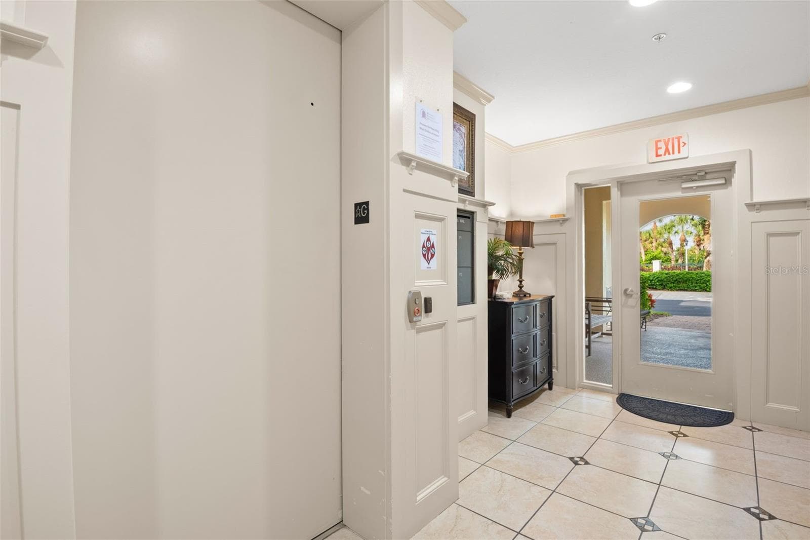 Entering into the building lobby with access to the elevator. - 8 ACADEMY WAY S #123, ST PETERSBURG