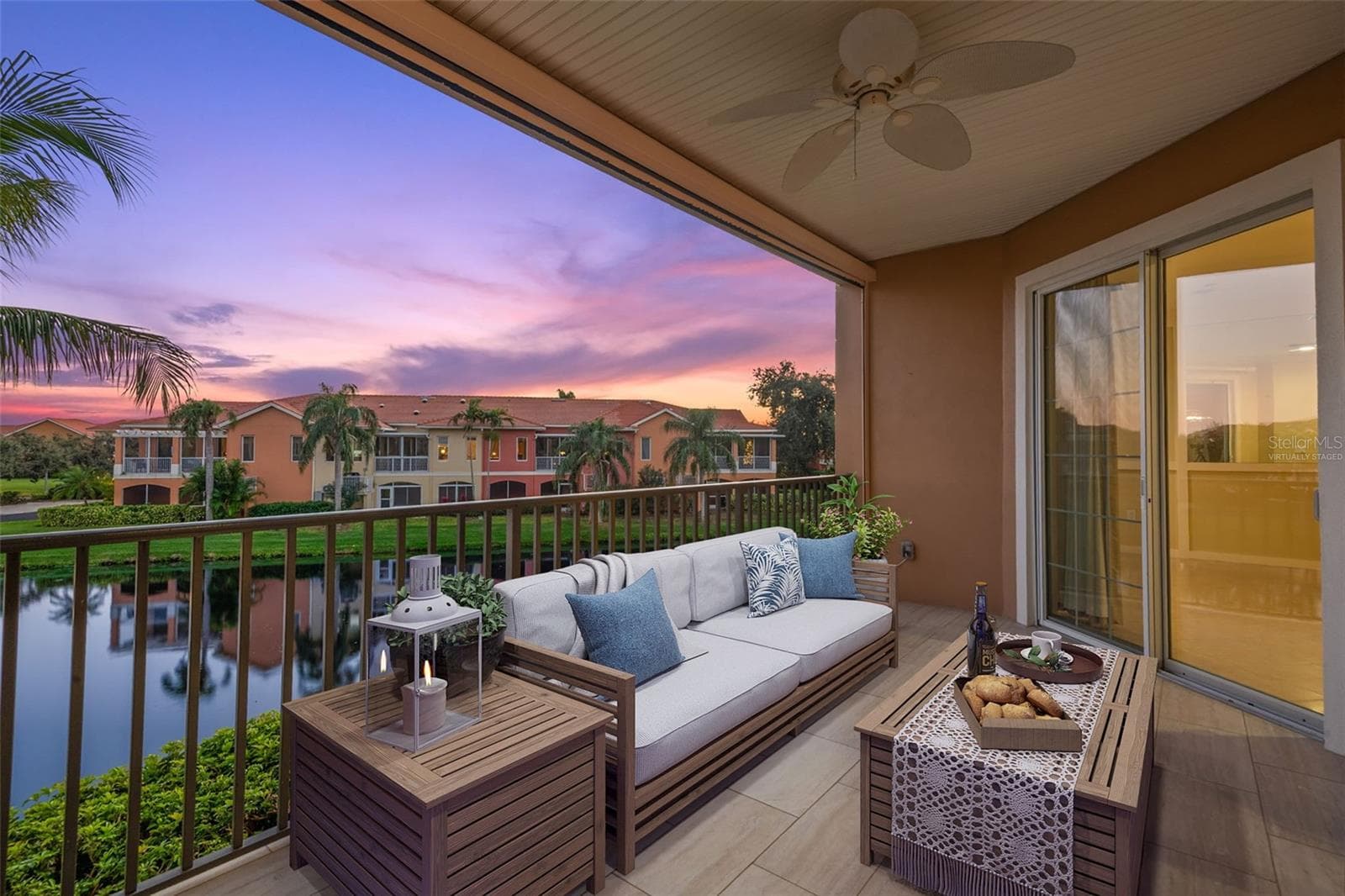 Virtually staged; Enjoy endless hours of sunset and sunrise views on Covered Terrace. Note retractable roll-down screen feature. - 8 ACADEMY WAY S #123, ST PETERSBURG