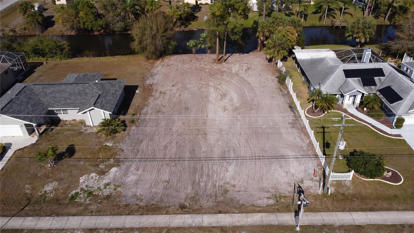 Front View CANAL in rear - 23326 PEACHLAND BLVD, PORT CHARLOTTE