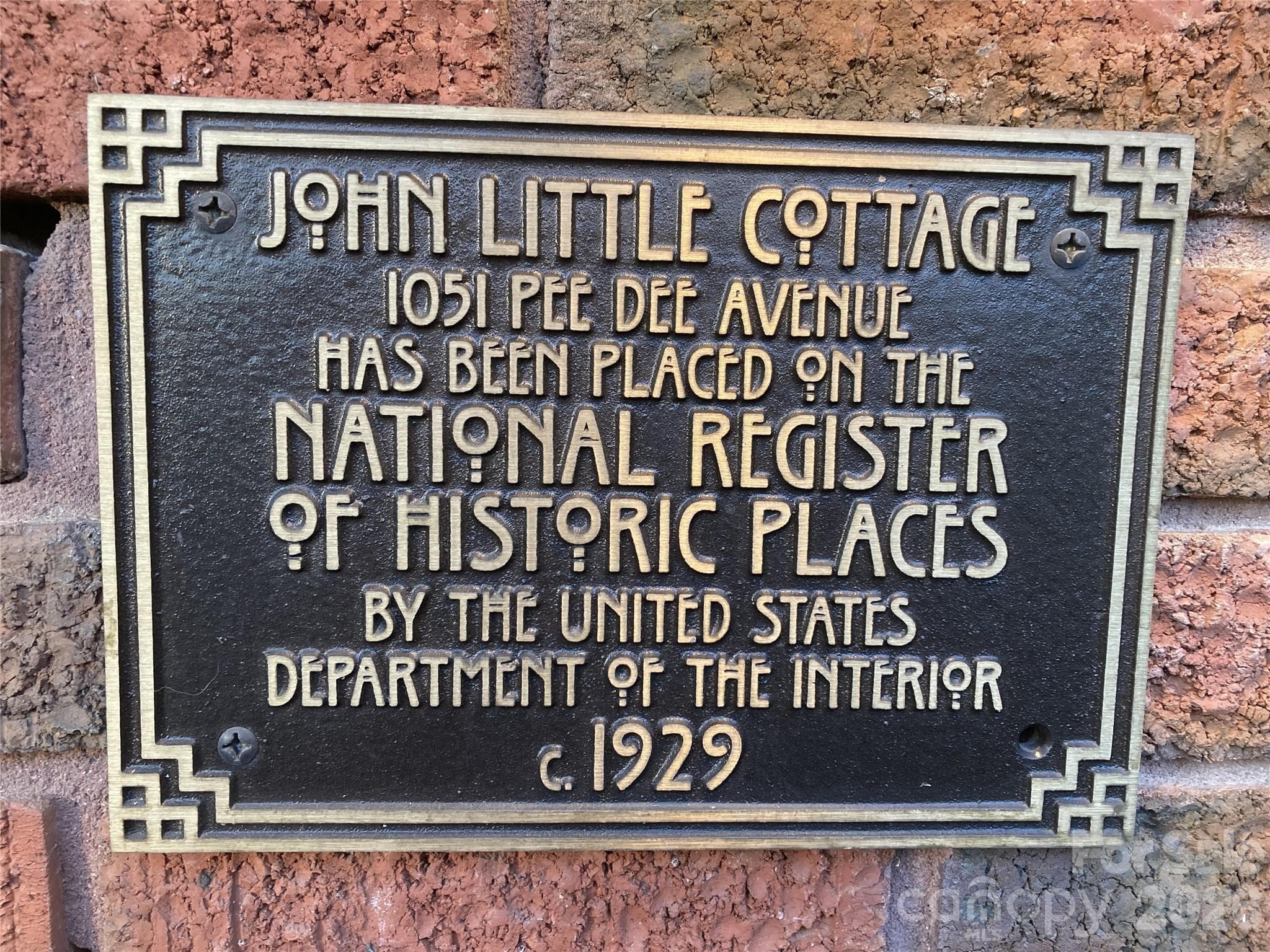 1051 Pee Dee Ave is a contributing structure to the Pee Dee Avenue Historic District. There is no local Architectural Board of Review in place so you are free to make any modifications without approval. - Albemarle