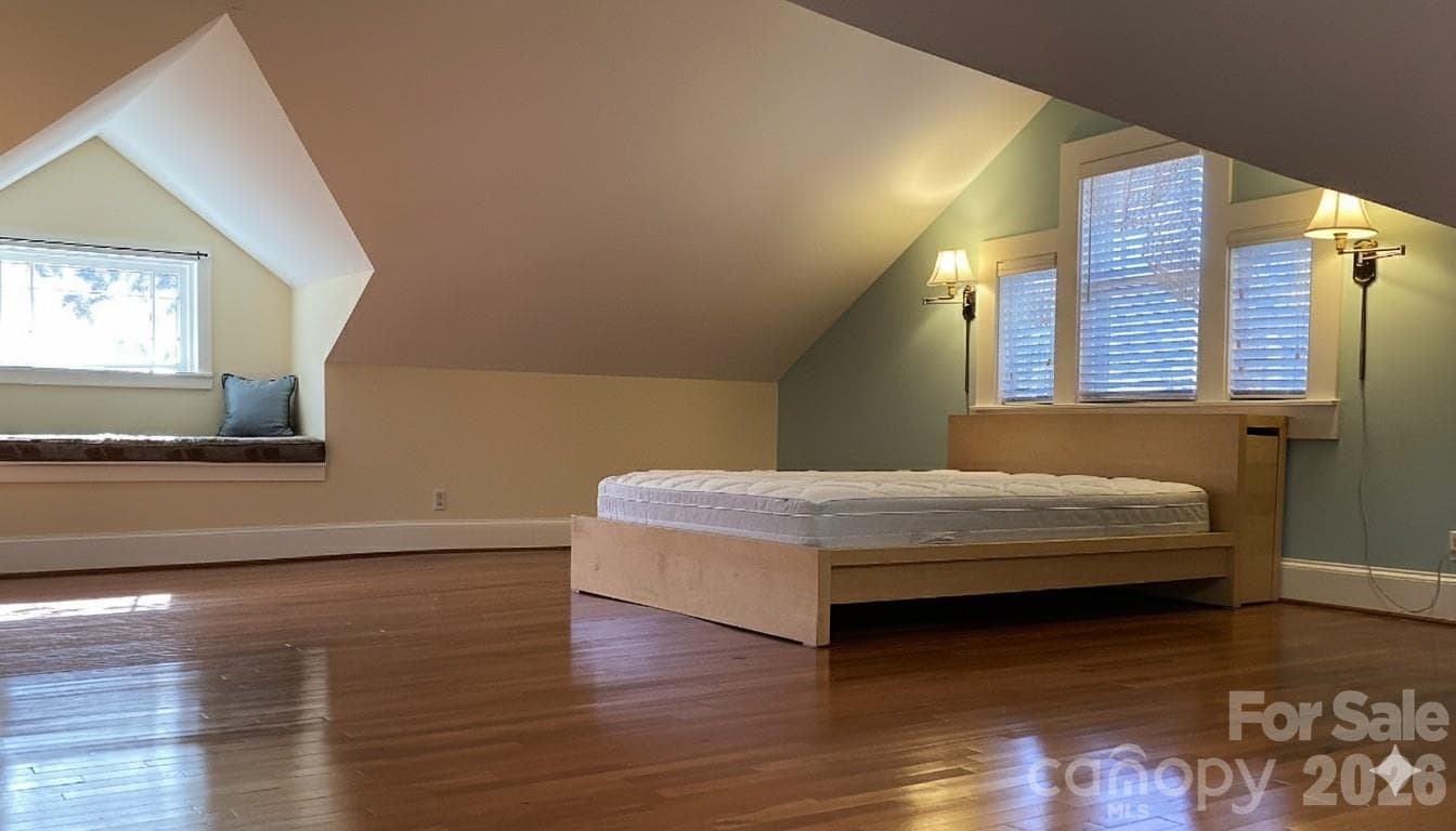 Spacious upper level primary bedroom. - 1051 Pee Dee Avenue, Albemarle