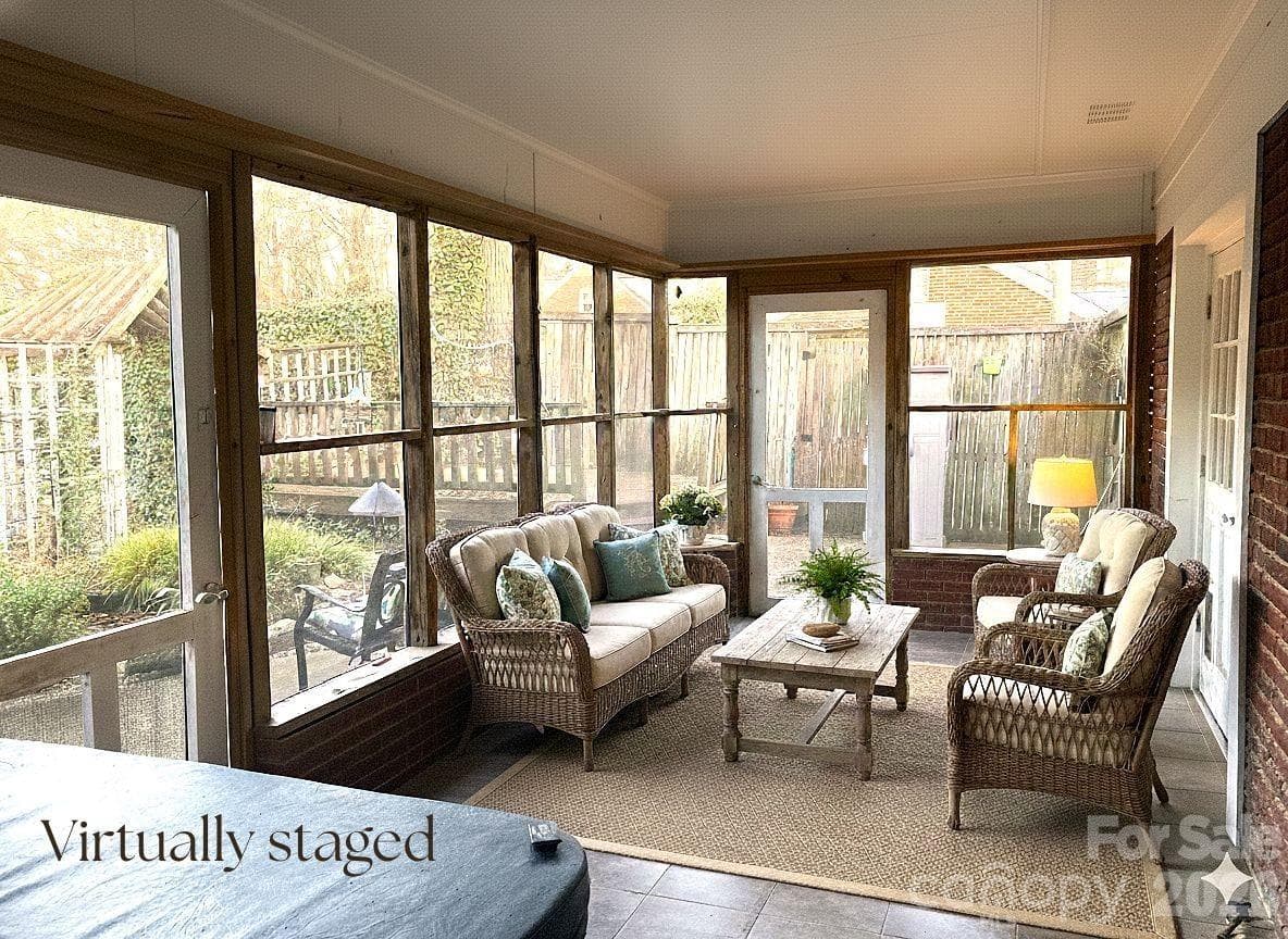 Virtually staged rear screen porch. - 1051 Pee Dee Avenue, Albemarle