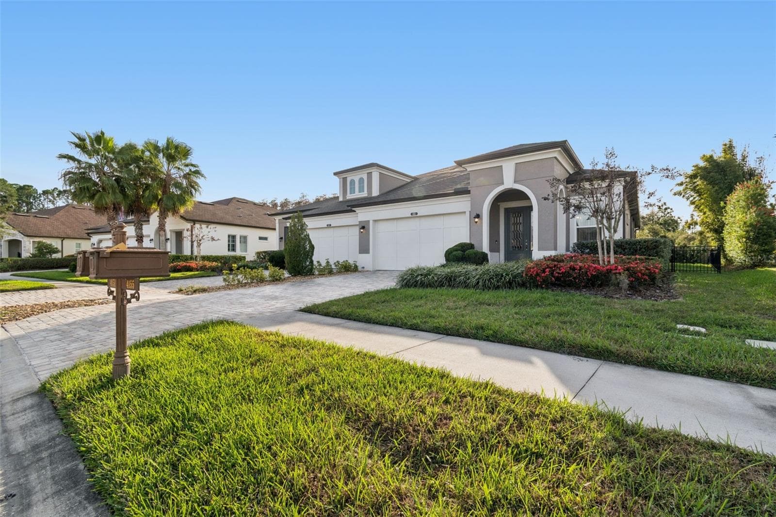 Welcoming front entry of the popular Caldwell floor plan - 4155 BARLETTA CT, WESLEY CHAPEL