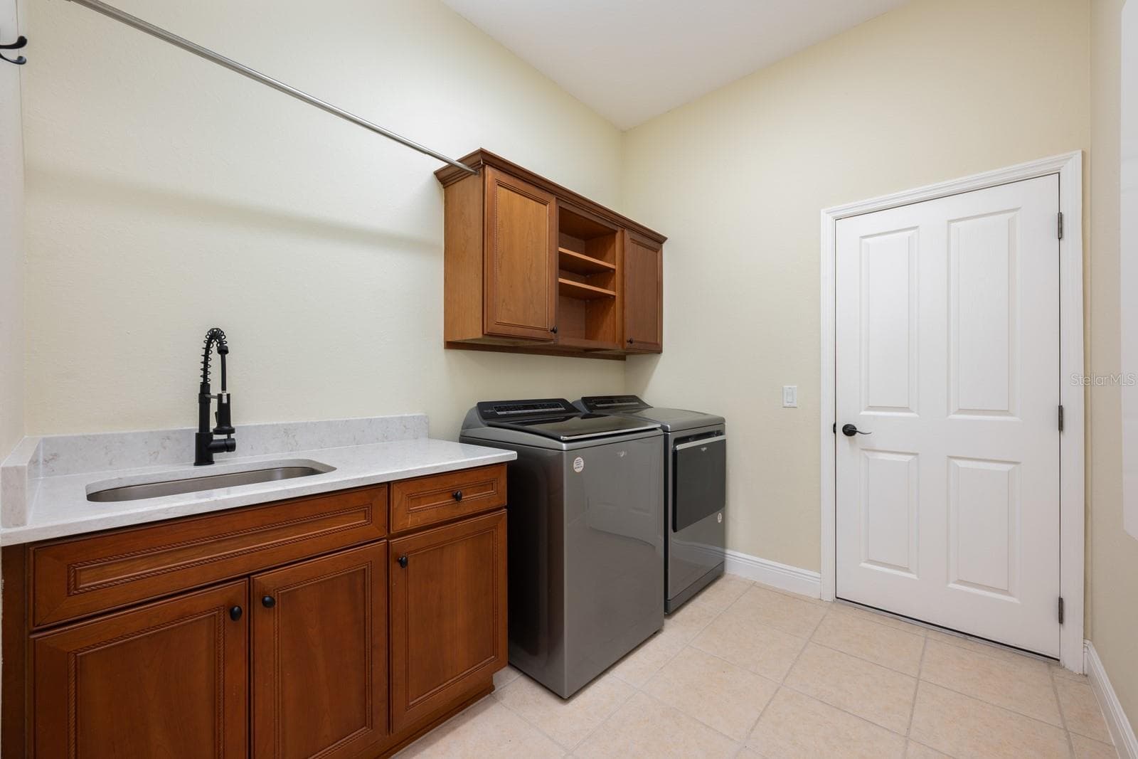 Large laundry room. - 5092 NE 81ST BLVD, WILDWOOD