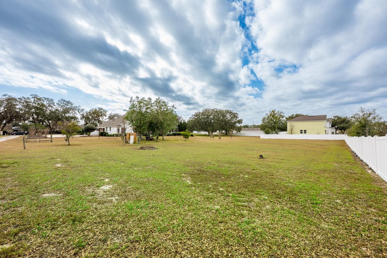 The second attached lot is fully buildable, offering endless possibilities – add a detached garage, workshop, guest home, or create a multi-generational setup. - 5092 NE 81ST BLVD, WILDWOOD