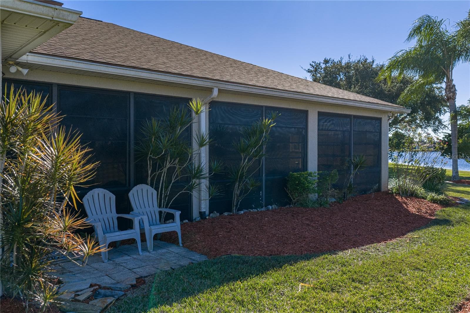 The paver patio is a great place to enjoy the view from the rear of the home. - 4360 ASHTON CLUB DR, LAKE WALES