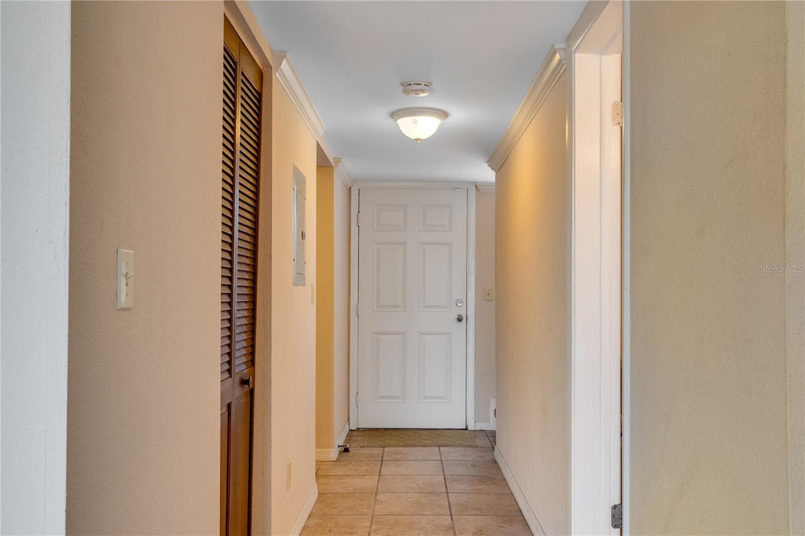Stairs with chair lift going to Primary & Second Bedrooms - 6315 NEWTOWN CIR #15B3, TAMPA