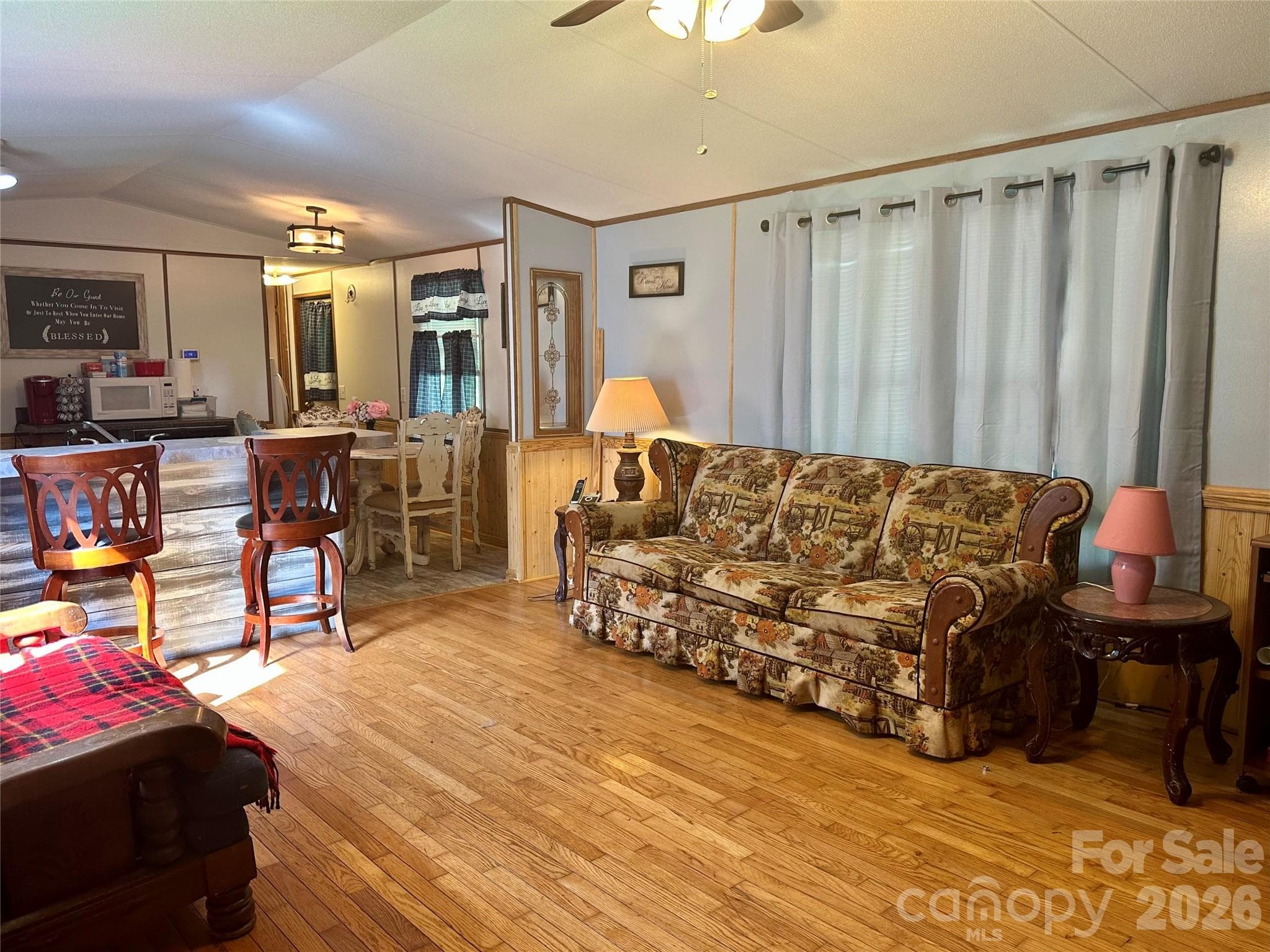 Living room with curtains closed - 492 Chestnut Mountain Road, Spruce Pine