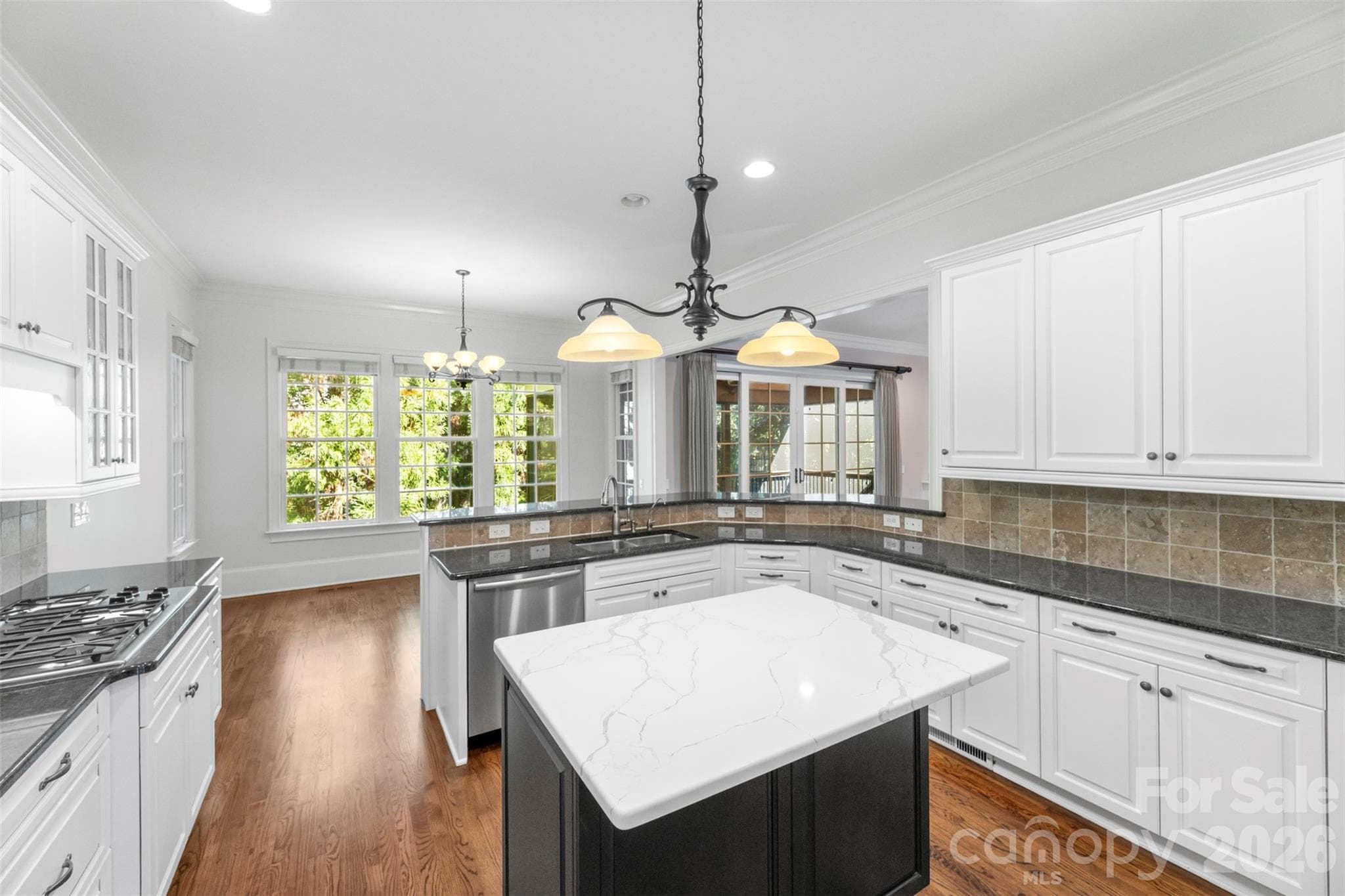 Kitchen with plenty of counterspace and island. - Charlotte