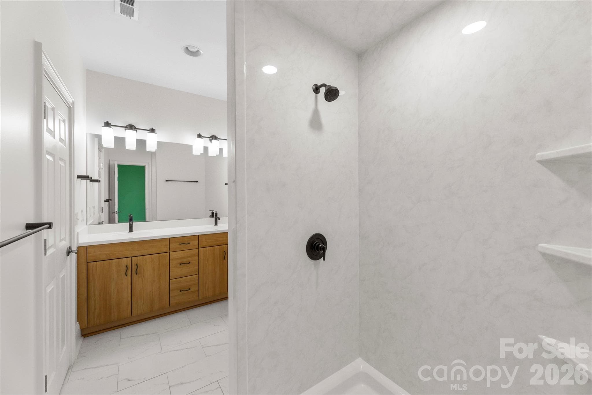 Renovated bath with custom glass on order - Charlotte