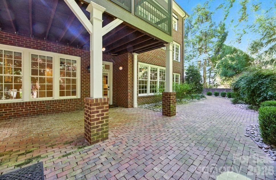 Walkout from basement onto the brick patio - Charlotte