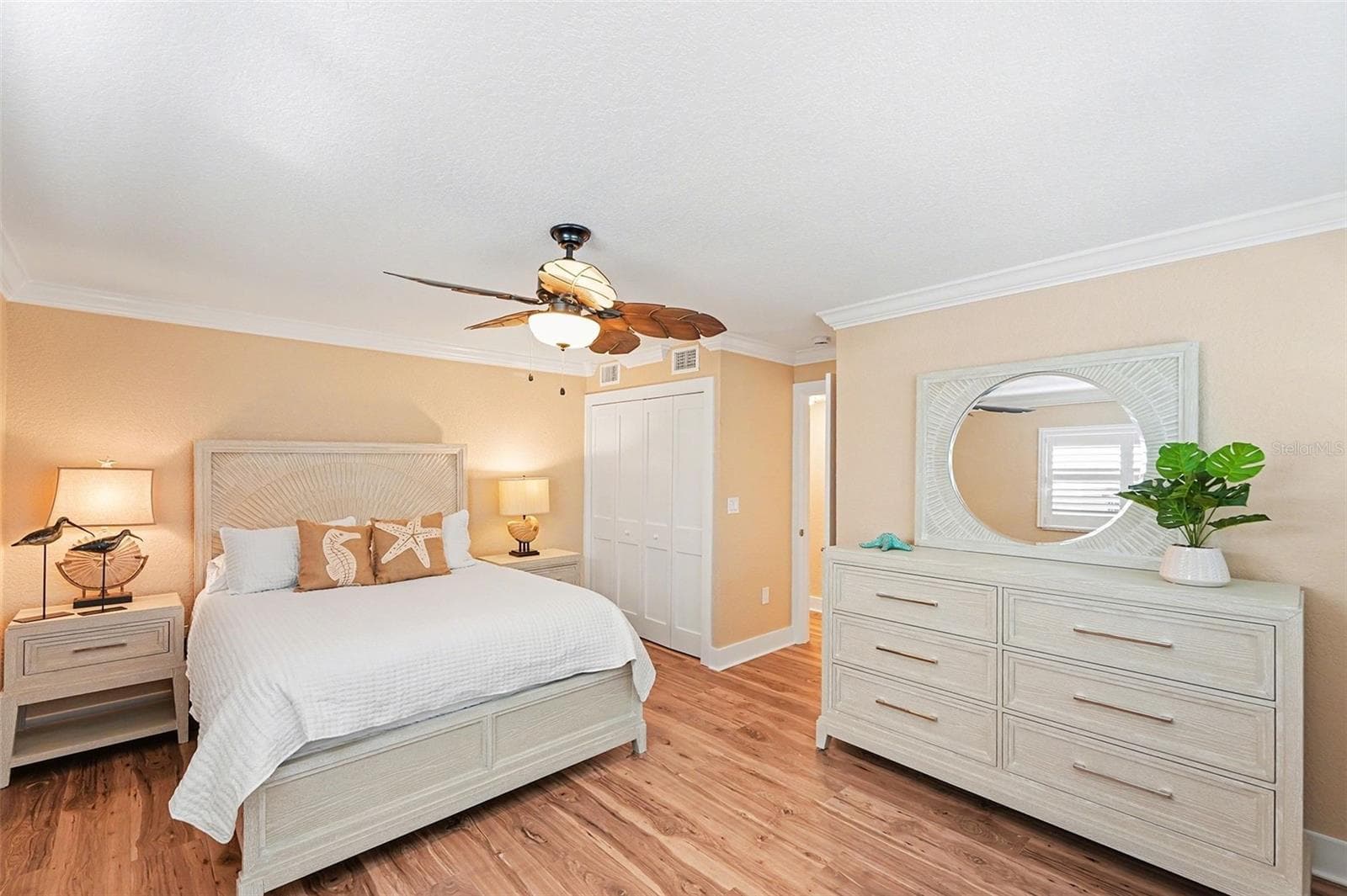 Bedroom #2 is a spacious guest room with East facing windows. Enjoy sunrises starting your days when they peek over partial views of the Intracoastal. - 19936 GULF BLVD, INDIAN SHORES