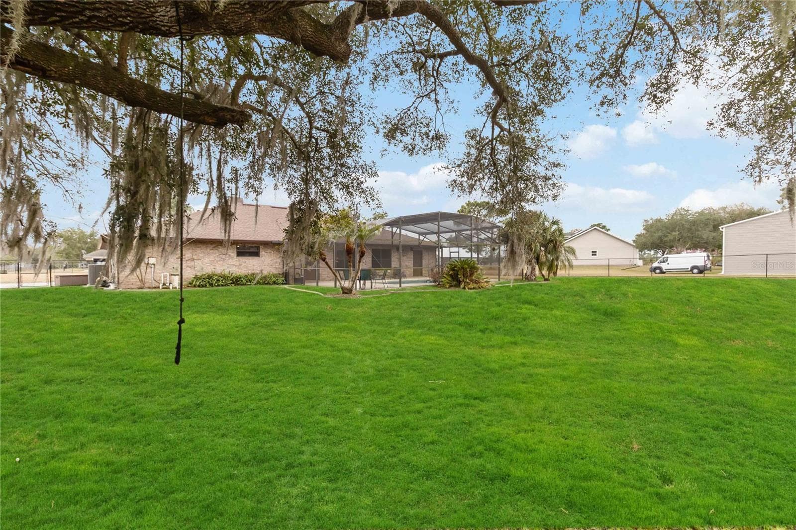 Back Yard View towards Home - 18711 NORTHCLIFF ST, ORLANDO