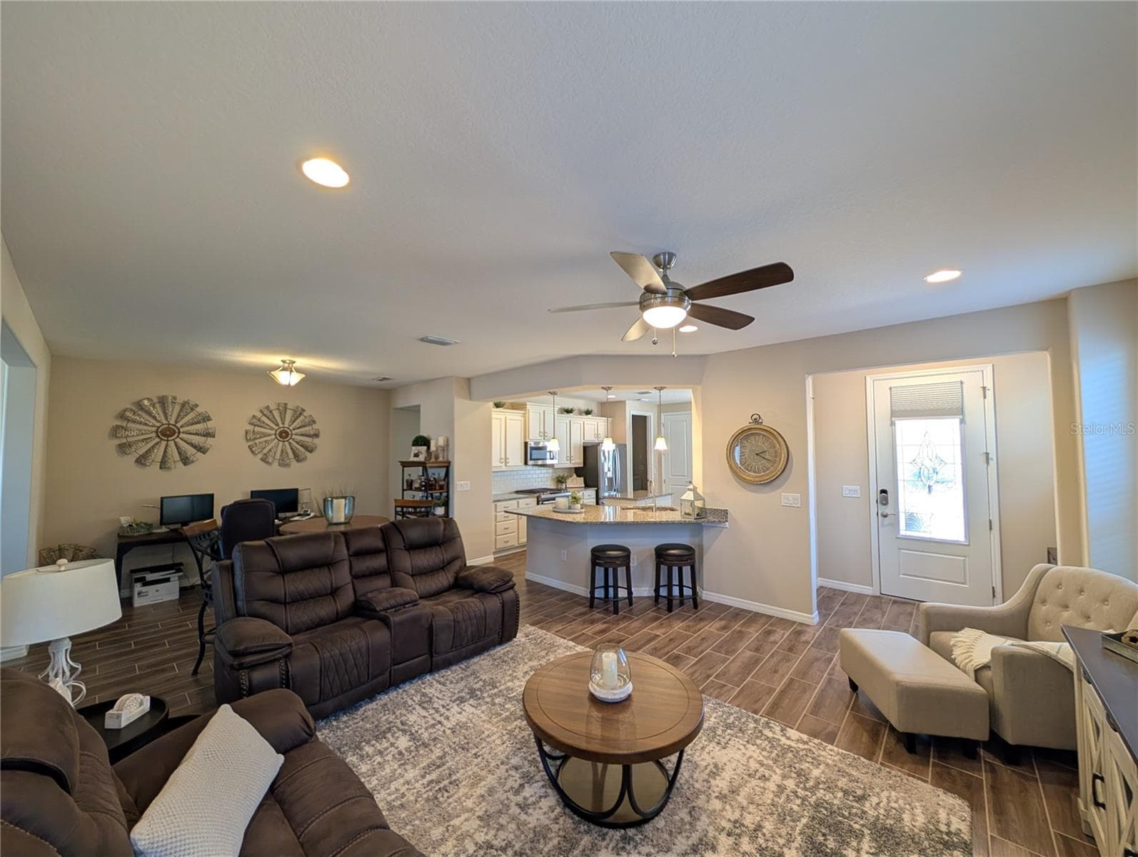Family room with view to Front Door and Kitchen - 4341 NW 57TH AVE, OCALA