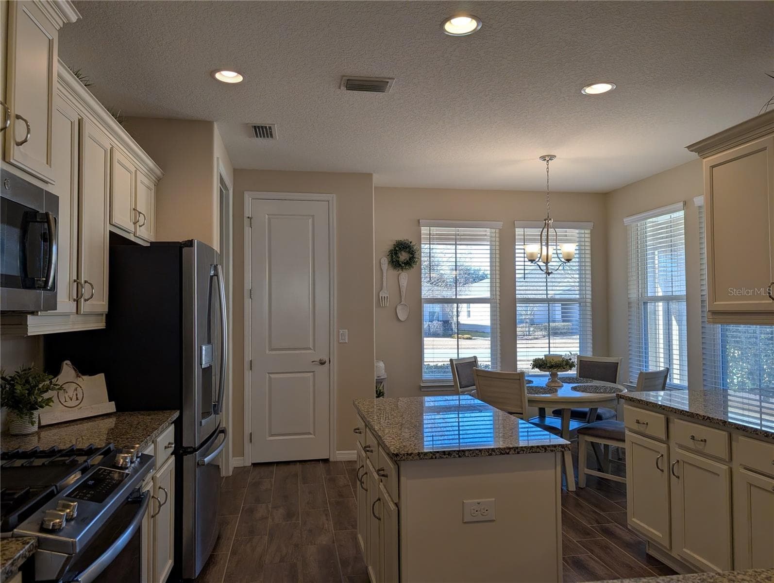 Looking into Kitchen with Breakfast nook - 4341 NW 57TH AVE, OCALA