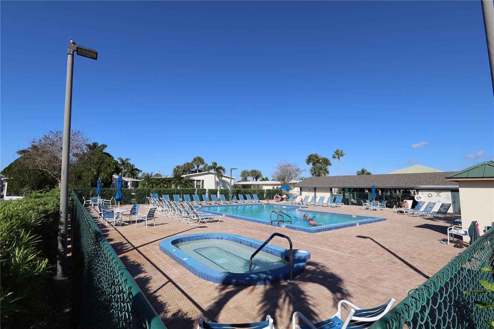 1 OF FOUR HEATED POOLS - 2100 KINGS HWY #52, PORT CHARLOTTE