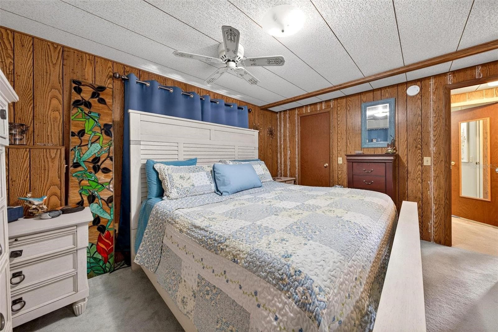 First master bedroom with walk-in closet - 1018 SOUTHLAND DR, TAVARES